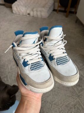 Kids Jordan’s White and Blue Basketball Sneakers